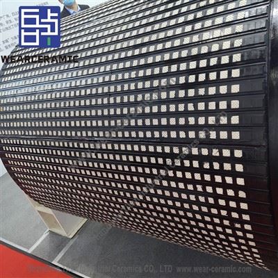 Trasportatore con rivestimento in gomma composita ceramica